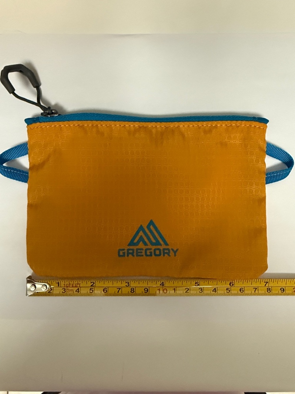Gregory Toiletry Pouch in Mustard Yellow with Blue Accents